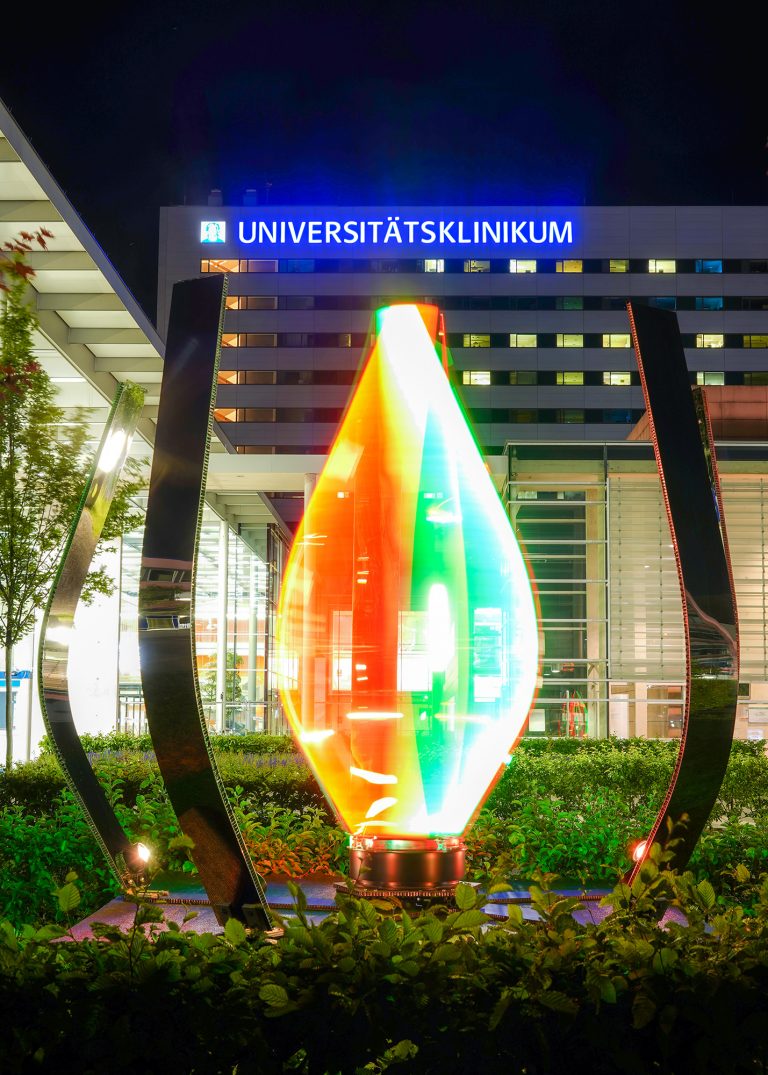 Colorful sculpture in front of Universitätsklinikum building.